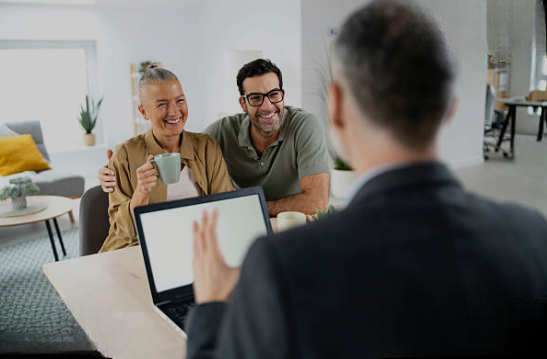 Happy couple with a laptop